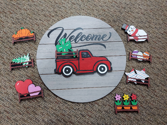 Welcome Sign with red truck